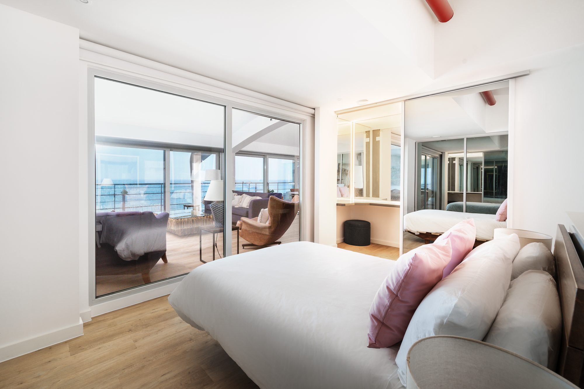 The main bedroom at Alexanders, opening onto the balcony