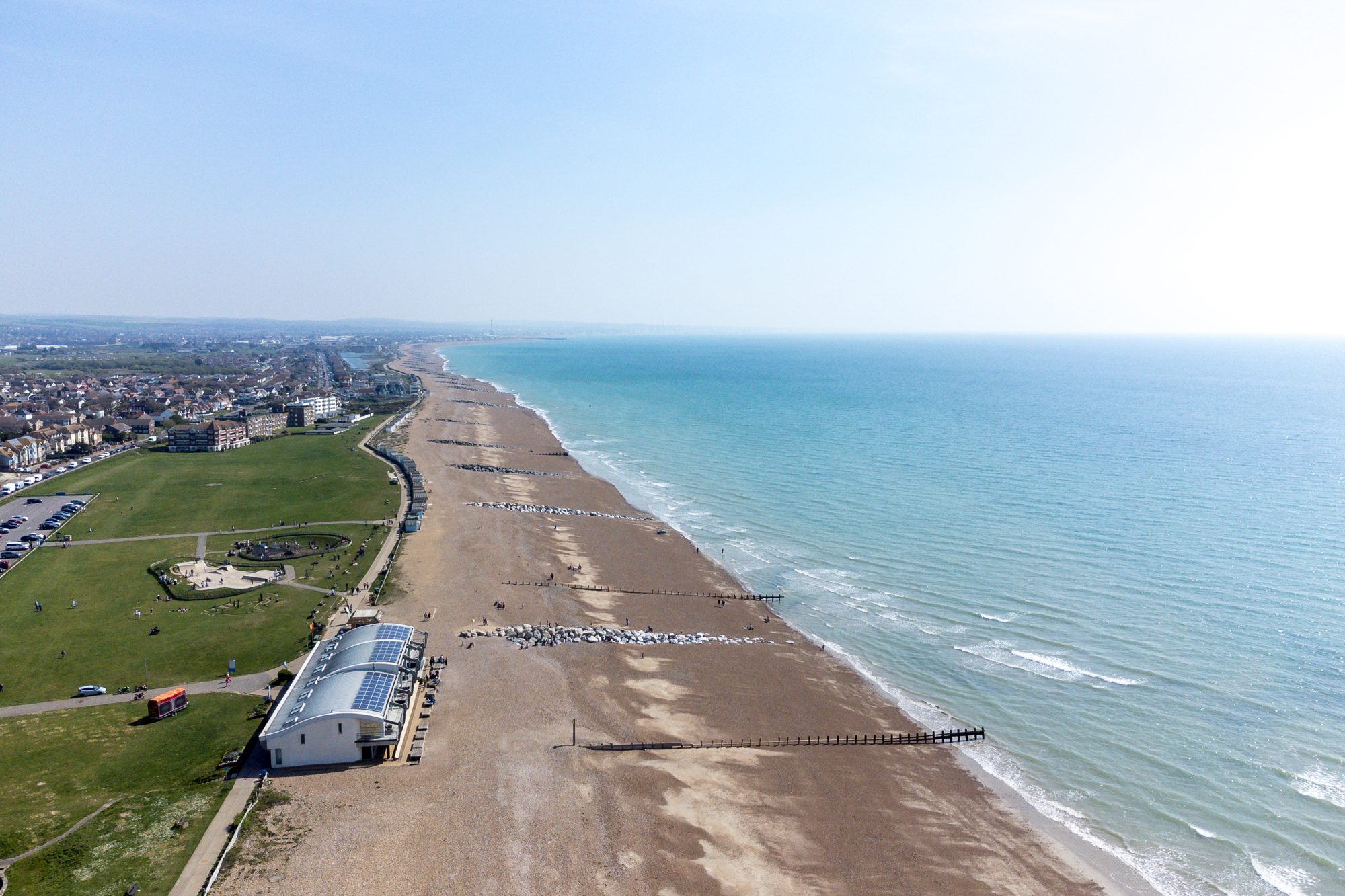 Lancing beach from the air, with the shingle, the groynes and the sea
